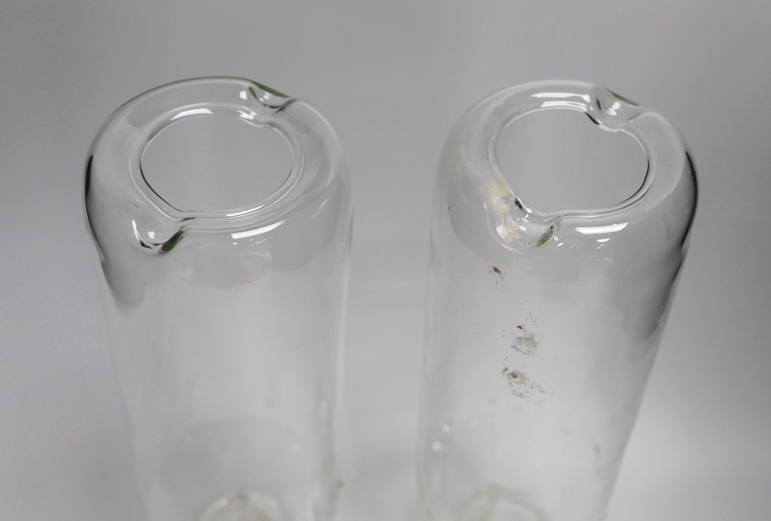 A pair of glass ‘hydrogen bomb’ shaped candleholders, 36cm tall